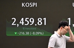 Korean shares tank as global rout continues