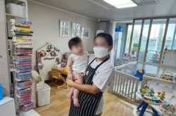 Pay debate plagues foreign nanny pilot