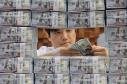 Korea to take action if currency falls more