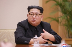 NK announces freeze on nuclear, missile tests