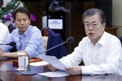 Moon apologizes for likely missing minimum wage target