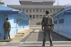 Two North Koreans deported as probe finds mass murder charge