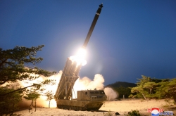 NK hails rocket test, US urges return to nuclear talks