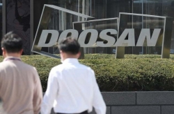 Doosan Infracore rallies on hope for new investor