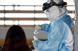 S. Korea adds 13 new virus cases; club-linked cases flatten
