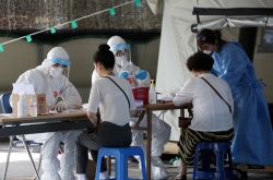 S. Korea reports 35 new virus cases, number down for 4th straight day