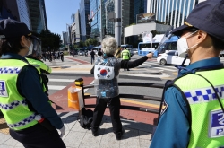 Banned from mass rallies, protesters  hold ‘press conferences’ on Hangeul Day
