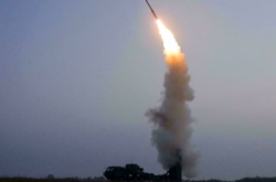 N. Korea test-fires new anti-aircraft missile: state media
