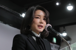 Yoon's wife publicly apologizes over allegations of falsifying resumes