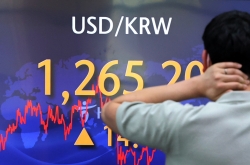Seoul stocks fall sharply on economic slowdown woes; Korean won hits over 2-yr low