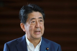 Former Japanese PM Abe rushed to hospital after possible shooting