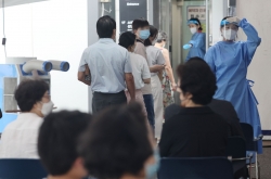 S. Korea’s daily cases reach 68,000, up 9.5 times from four weeks ago