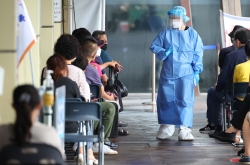 S. Korea's new COVID-19 cases jump to 4-month high, deaths tallied at 50