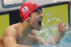 S. Korean Ji Yu-chan grabs stunning swimming gold