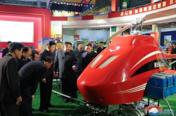 N. Korean leader attends farm machinery exhibition