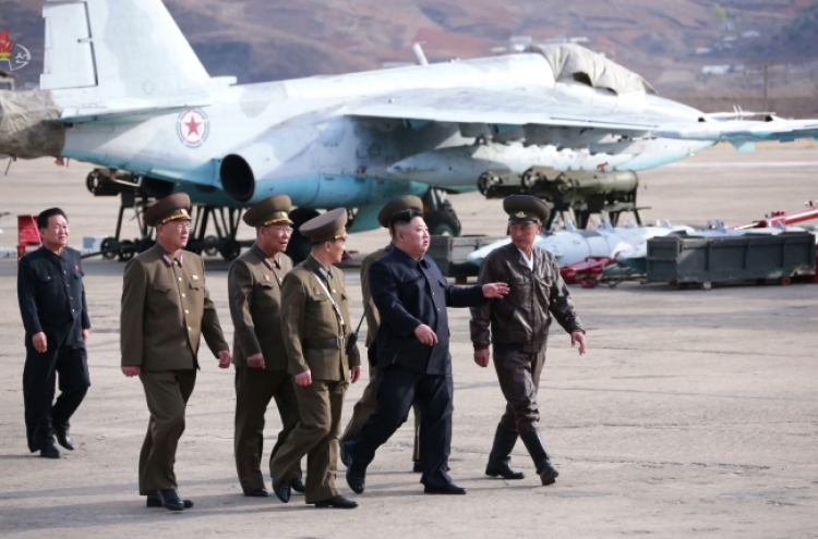 NK leader supervises test-fire of new tactical guided weapon: KCNA