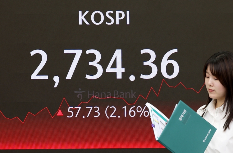 Seoul shares open higher on institutional buying