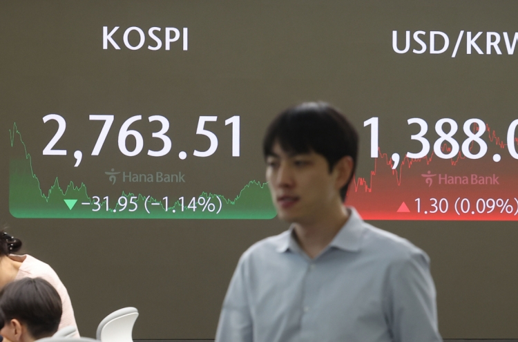 Seoul shares fall over 1 pct as chip stocks slip