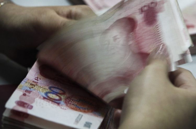 China may deflect pressure with smaller surplus