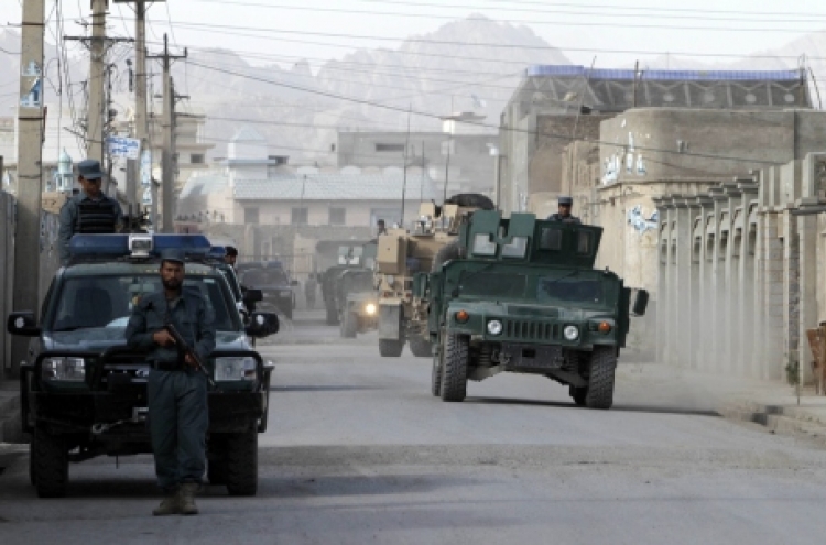 Taliban break more than 450 out of Afghan prison