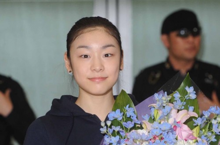 Kim Yu-na returns home