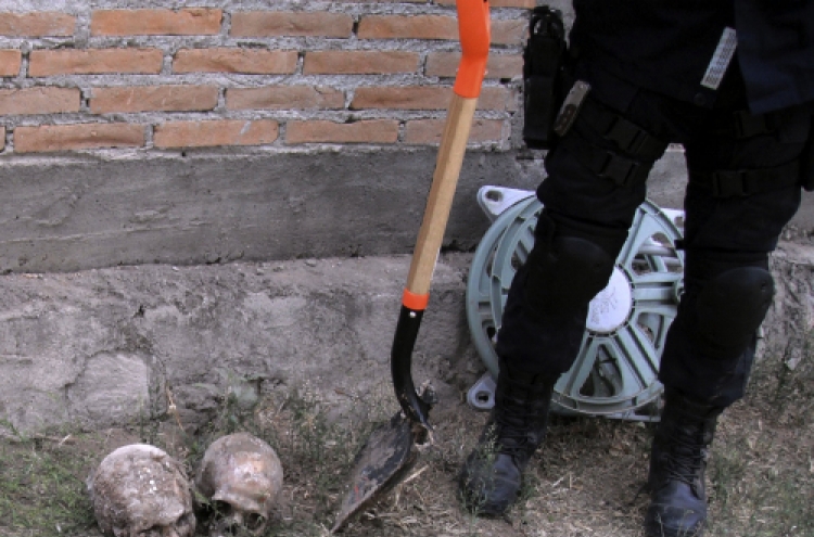 3 bodies found in Mexico mass graves identified