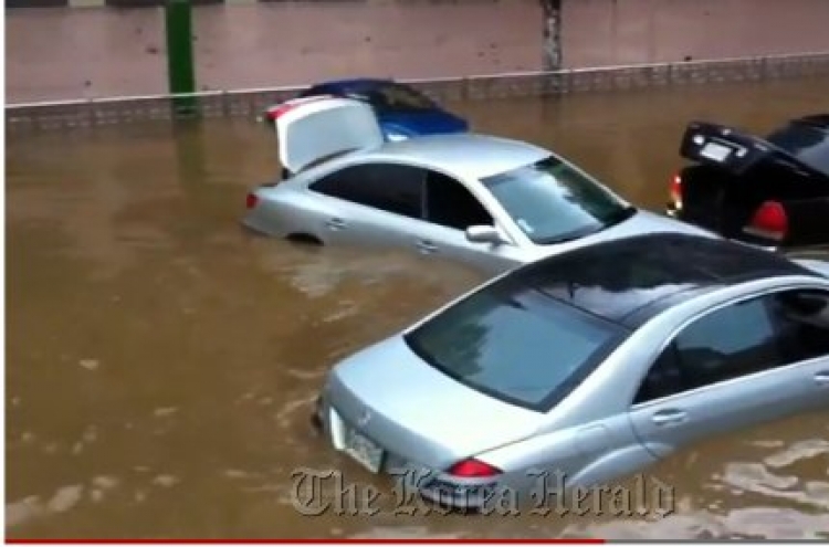 Auto insurers face claims from rain damage