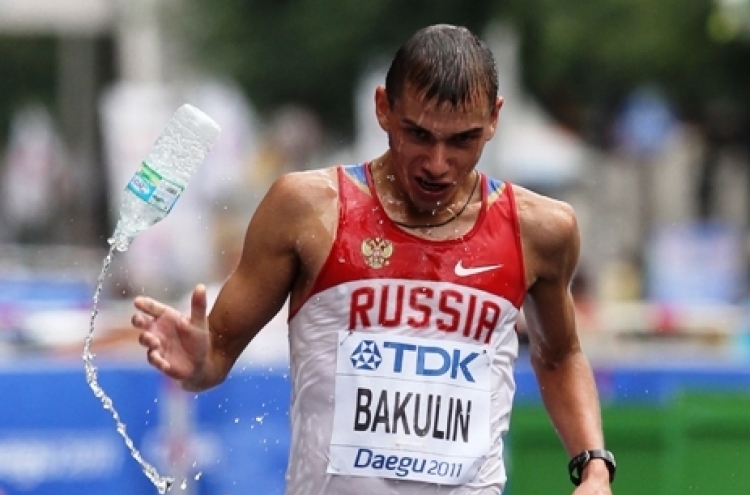 Russia sweeps walk titles with Bakulin's 50km