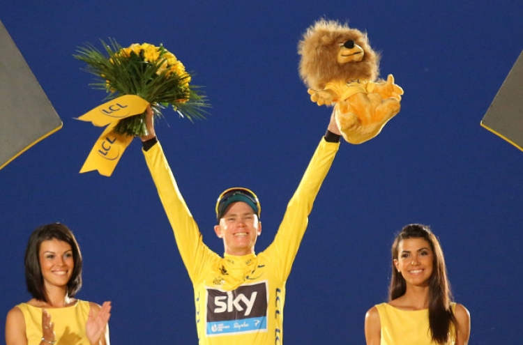 Froome rides to victory in 100th Tour de France