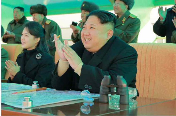 N. Korean leader, wife make appearance at air combat competition