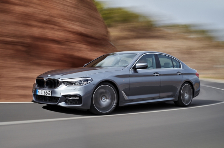 BMW aims to overtake top-seeded Benz with new 5 series