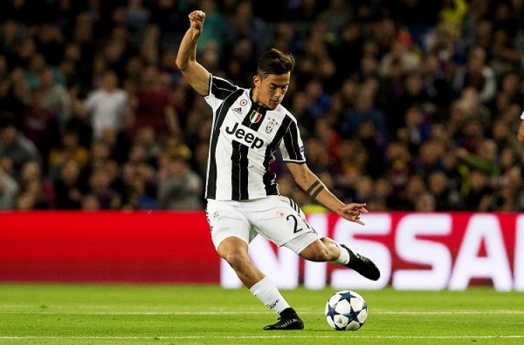 Juventus hold firm to knock out Barcelona