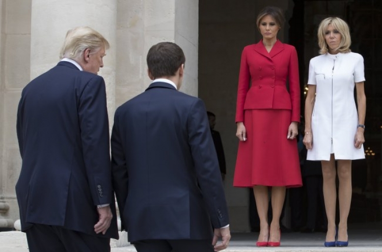 Trump caught on tape complimenting  Macron's wife's body