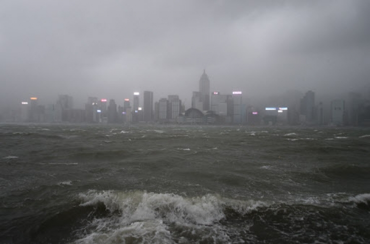 Four dead as typhoon smashes into Macau and Hong Kong