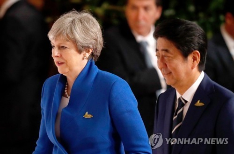 UK PM 'outraged' by N. Korea missile ahead of Japan trip