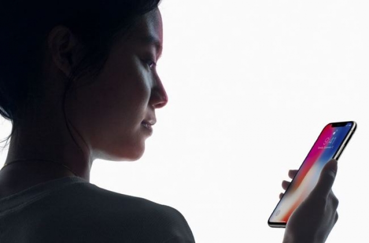 Apple unveils iPhone X with new display as rivals grow