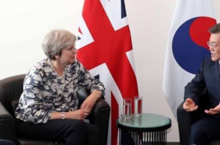 S. Korean, British leaders agree to seek peaceful resolution of NK nukes