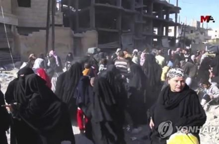 3,000 civilians flee Syria's Raqa under deal: militia spokesman