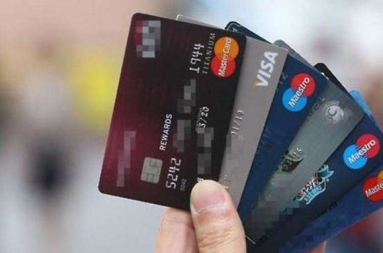 Card firms' Q3 profit tumbles 20% on fee cuts