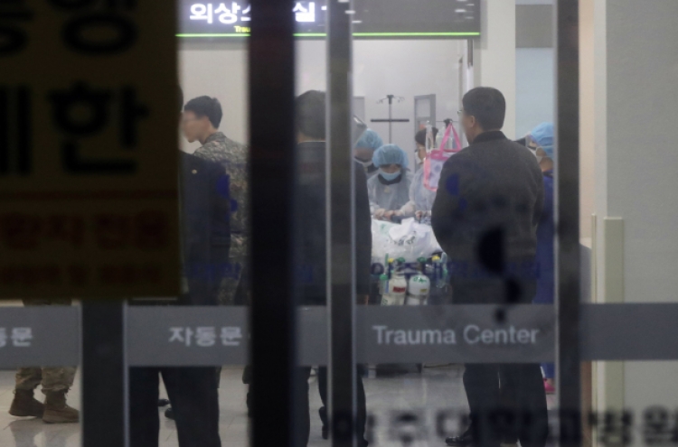 Wounded N. Korean soldier breathes spontaneously on own: officials