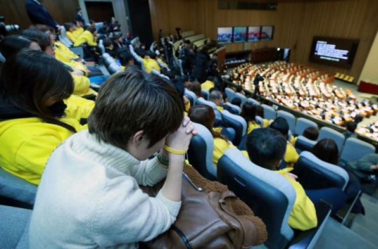 Parliament passes law to reinvestigate Sewol sinking