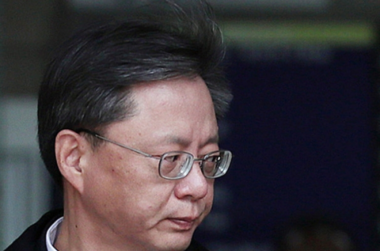 Ex-Park aide Woo arrested for alleged illegal surveillance