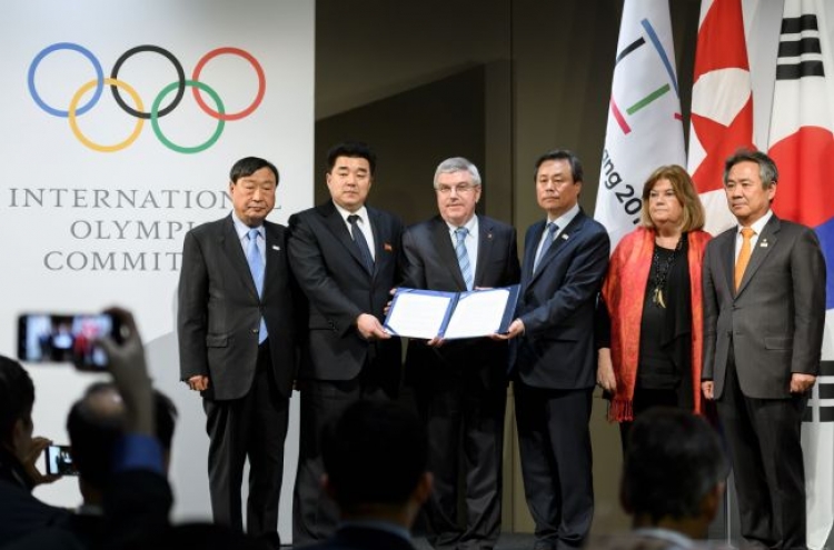 Talks open at Korean Olympic unity meeting in Switzerland