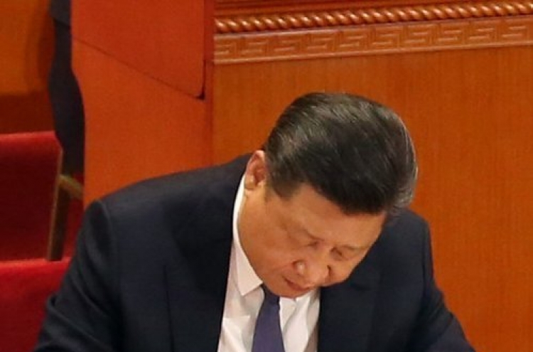 Xi's life mandate seals march of the strongmen