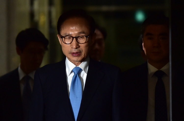 Ex-President Lee admits to receiving illicit money from state spy agency