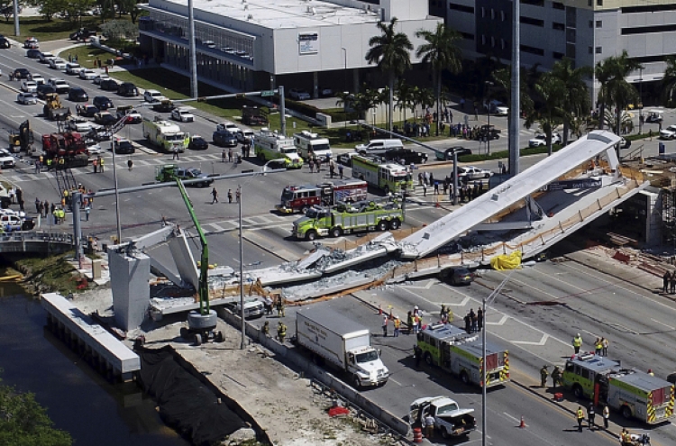 At least 4 dead, 9 injured, in Florida bridge collapse