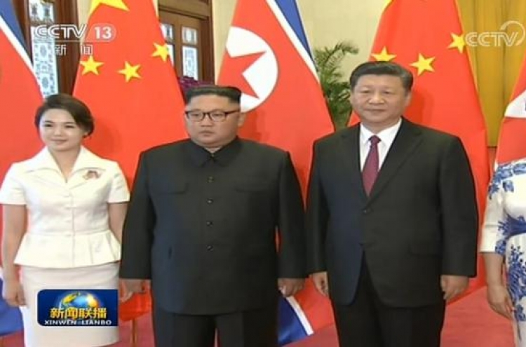 N. Korean leader Kim holds summit with Xi