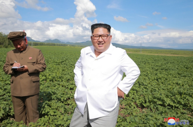 NK leader Kim inspects construction sites, farm