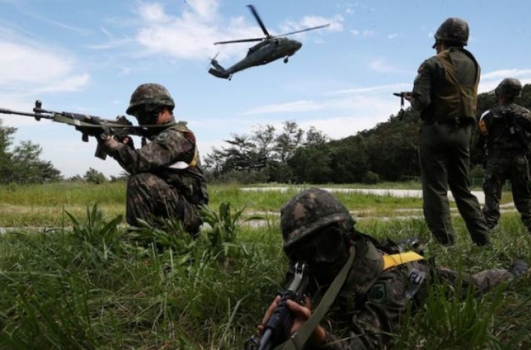 South Korea suspends annual defense drill