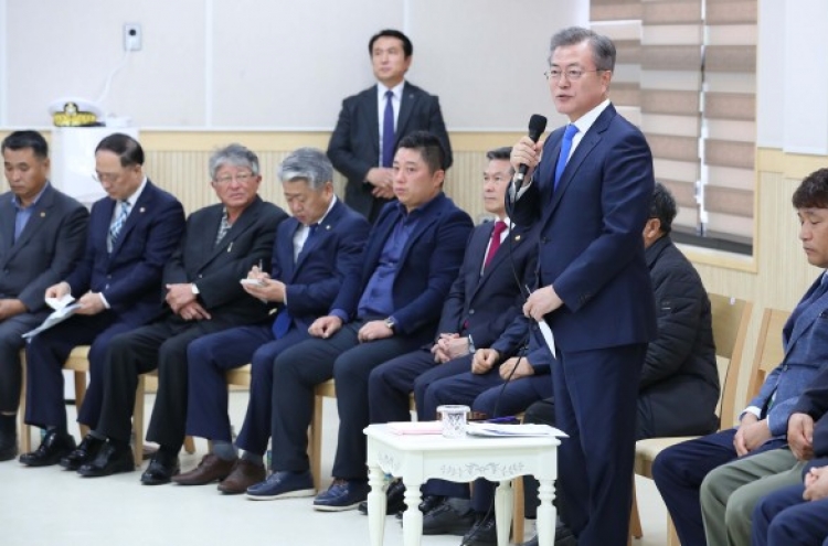Moon voices regret over dispute over building of naval base